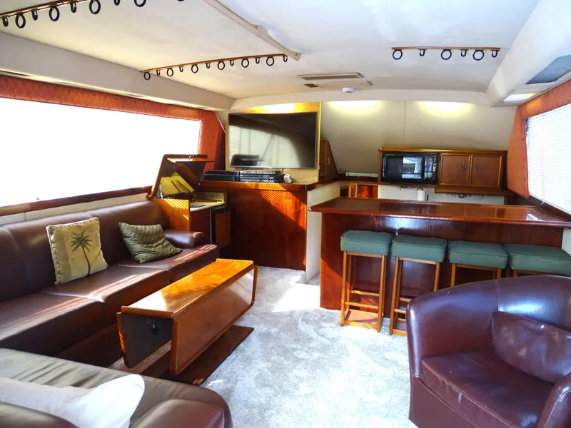 Slide: The Image of Luxurious interior of 1987 Ocean Yachts 48 with leather seating and modern amenities. - 9