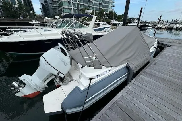 Slide: The Image of 2022 Zar Formenti Zar 79 boat interior with white seating and sleek design. - 10