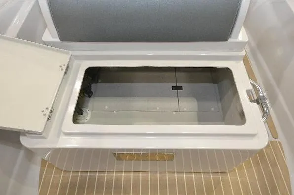 Slide: The Image of Open storage compartment on 2022 Zar Formenti Zar 79 boat interior. - 12
