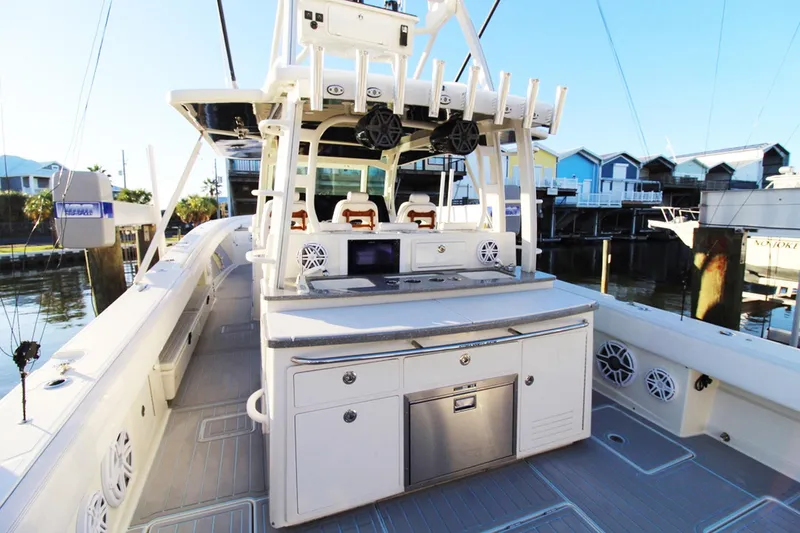 Slide: The Image of 2017 HCB Suenos boat with sleek deck and modern amenities. - 10