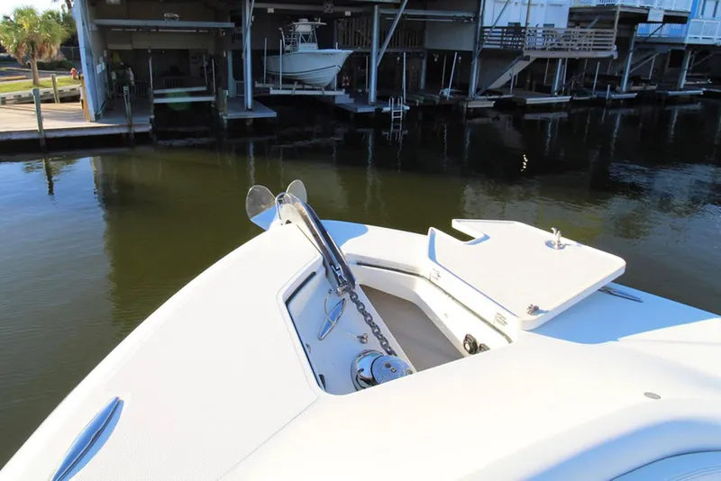 Slide: The Image of Bow of 2017 HCB Suenos boat docked in marina. - 30