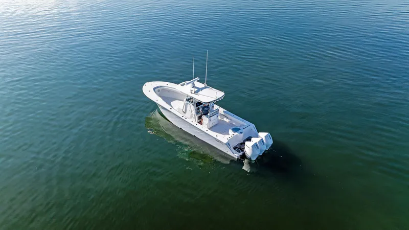 Slide: The Image of 2018 Onslow Bay 33 Tournament boat on calm water. - 18