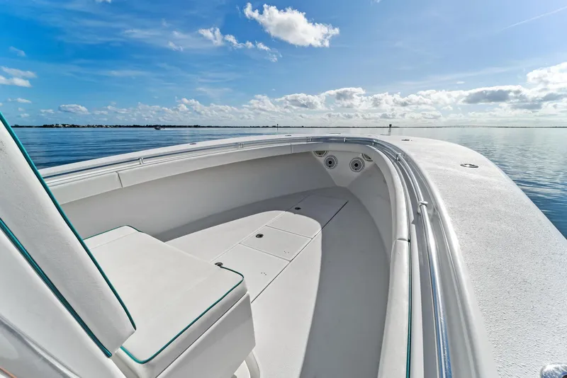 Slide: The Image of 2018 Onslow Bay 33 Tournament boat on calm ocean under blue sky. - 24