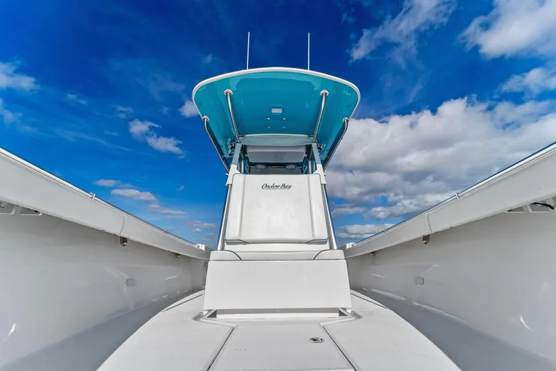 Slide: The Image of 2018 Onslow Bay 33 Tournament boat under clear blue sky. - 26