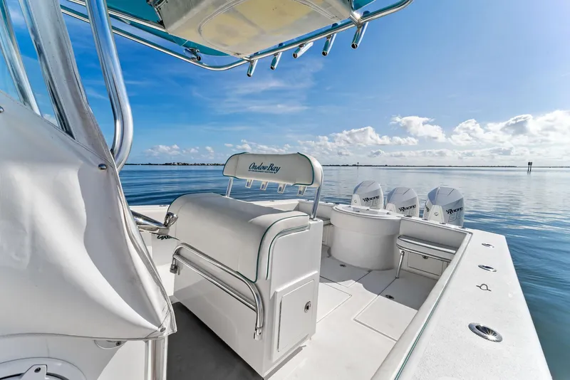 Slide: The Image of 2018 Onslow Bay 33 Tournament boat on calm water, clear sky background. - 29