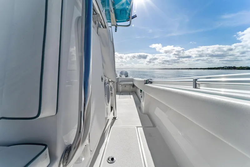 Slide: The Image of 2018 Onslow Bay 33 Tournament boat deck under sunny sky. - 30