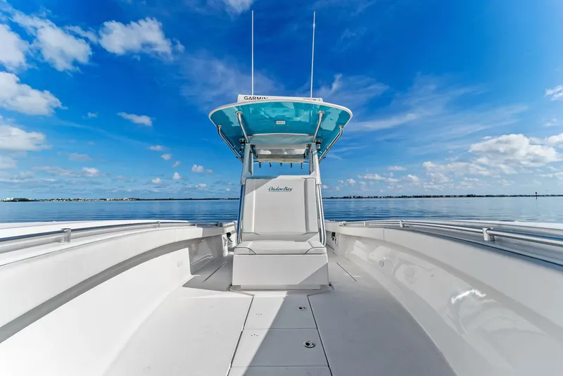 Slide: The Image of 2018 Onslow Bay 33 Tournament boat on calm water under blue sky. - 44