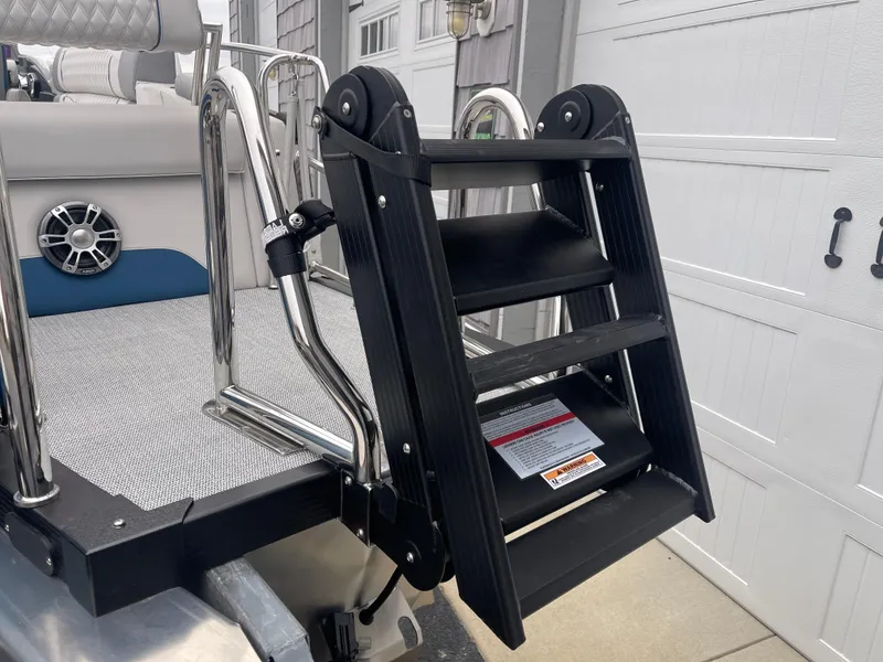 Slide: The Image of 2025 Avalon 2585 Excalibur LTD boat ladder and deck detail. - 10