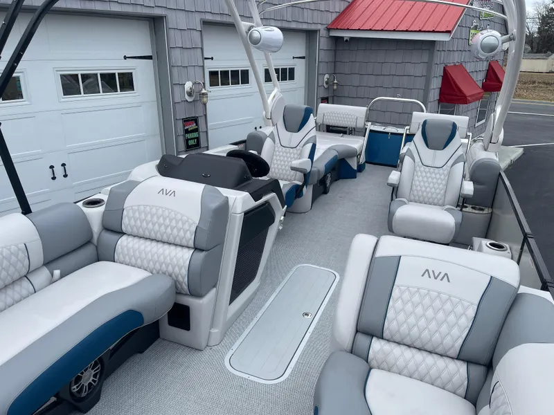 Slide: The Image of Luxurious 2025 Avalon 2585 Excalibur LTD boat with plush seating and modern design. - 15