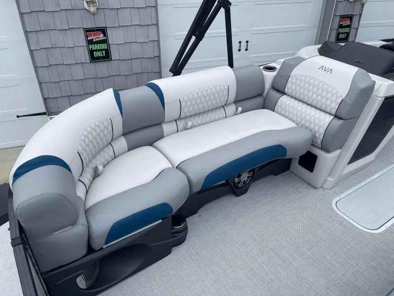 Slide: The Image of Luxurious seating on 2025 Avalon 2585 Excalibur LTD pontoon boat with premium upholstery. - 16