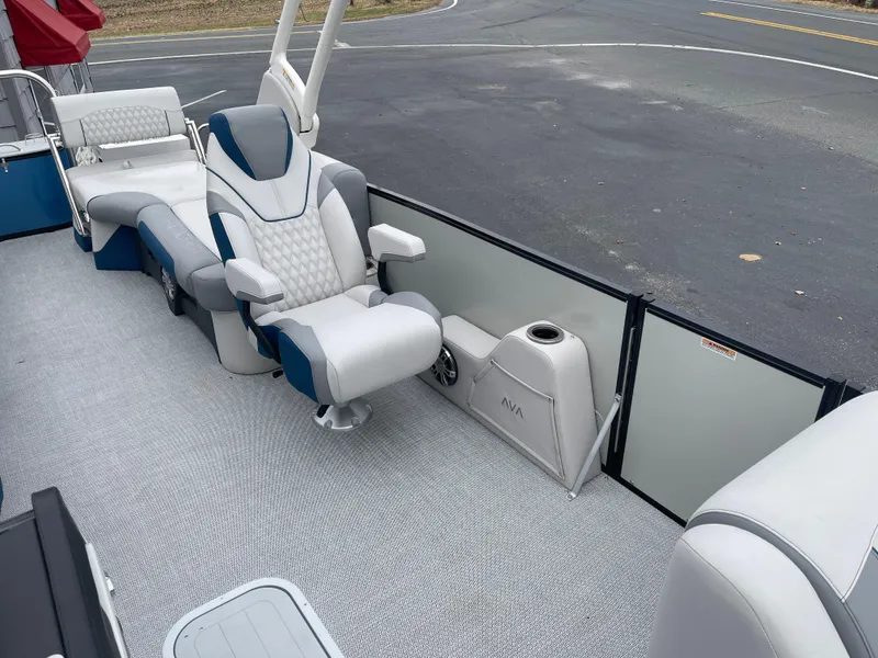 Slide: The Image of 2025 Avalon 2585 Excalibur LTD boat interior with luxurious seating and modern design. - 17