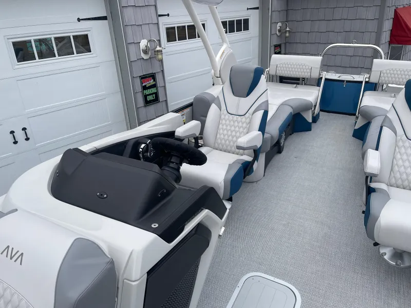 Slide: The Image of 2025 Avalon 2585 Excalibur LTD boat interior with luxurious seating and modern design. - 18