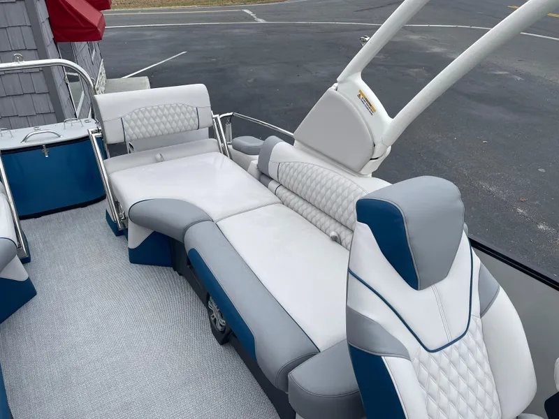 Slide: The Image of Luxurious seating on 2025 Avalon 2585 Excalibur LTD pontoon boat with high-performance features. - 19