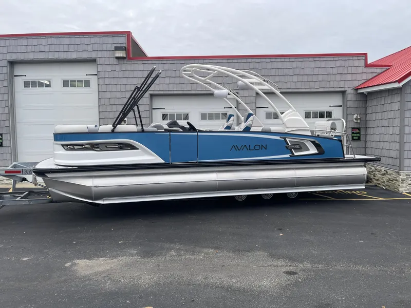 Slide: The Image of 2025 Avalon 2585 Excalibur LTD Tri Toon boat with Mercury 400hp V-10 Verado engine. - 2