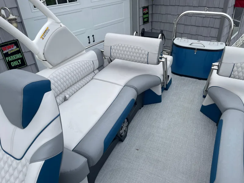 Slide: The Image of Luxurious 2025 Avalon 2585 Excalibur LTD boat interior with plush seating and modern design. - 22
