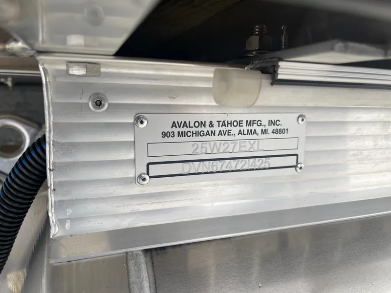Slide: The Image of Avalon 2585 Excalibur LTD identification plate, showcasing manufacturing details and serial number. - 32