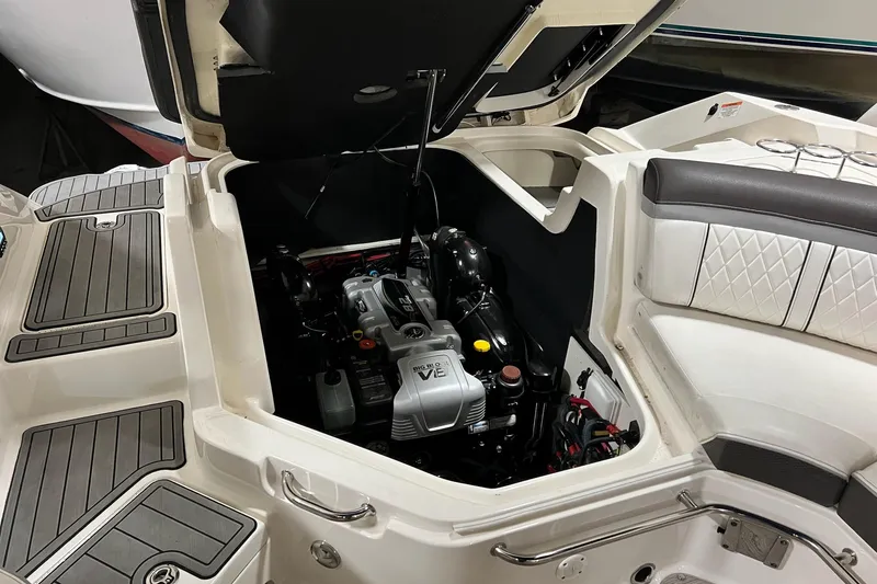 Slide: The Image of Engine compartment of a 2017 Sea Ray 280 SLX boat, showcasing the engine details. - 13