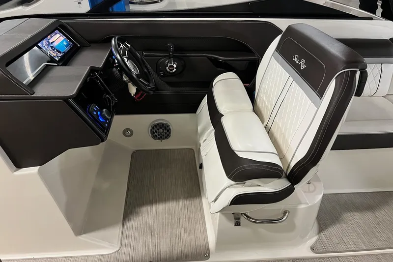 Slide: The Image of 2017 Sea Ray 280 SLX helm with modern controls and luxurious seating. - 14