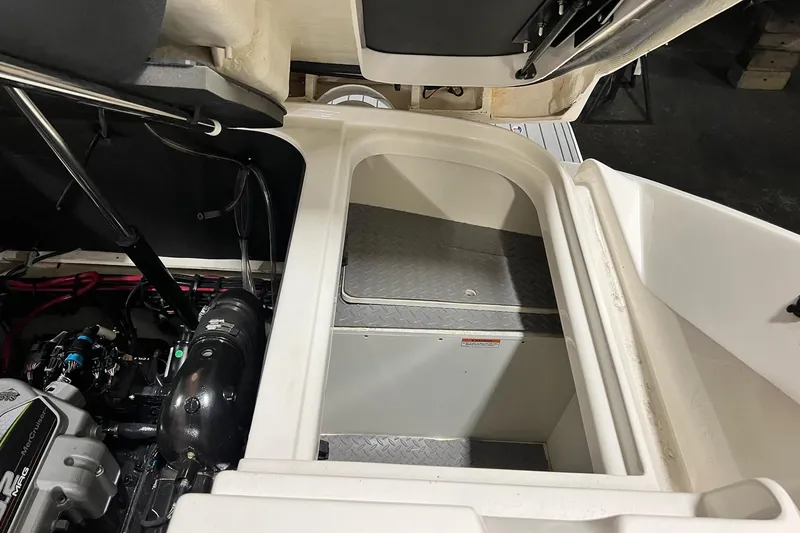 Slide: The Image of Engine compartment of 2017 Sea Ray 280 SLX boat, showcasing interior details and components. - 22