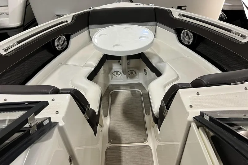 Slide: The Image of 2017 Sea Ray 280 SLX boat interior with seating and table. - 7