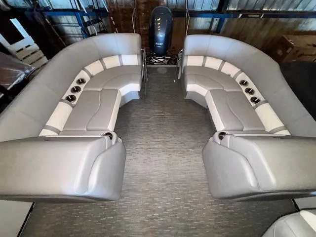 Slide: The Image of 2023 Bennington 23 L Fastback pontoon boat interior with spacious seating and modern design. - 11