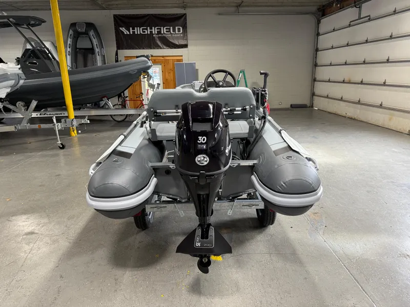 Slide: The Image of 2025 Highfield Classic 380 FCT inflatable boat in a showroom. - 3
