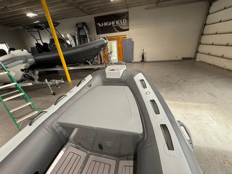 Slide: The Image of 2025 Highfield Classic 380 FCT inflatable boat in a showroom. - 6