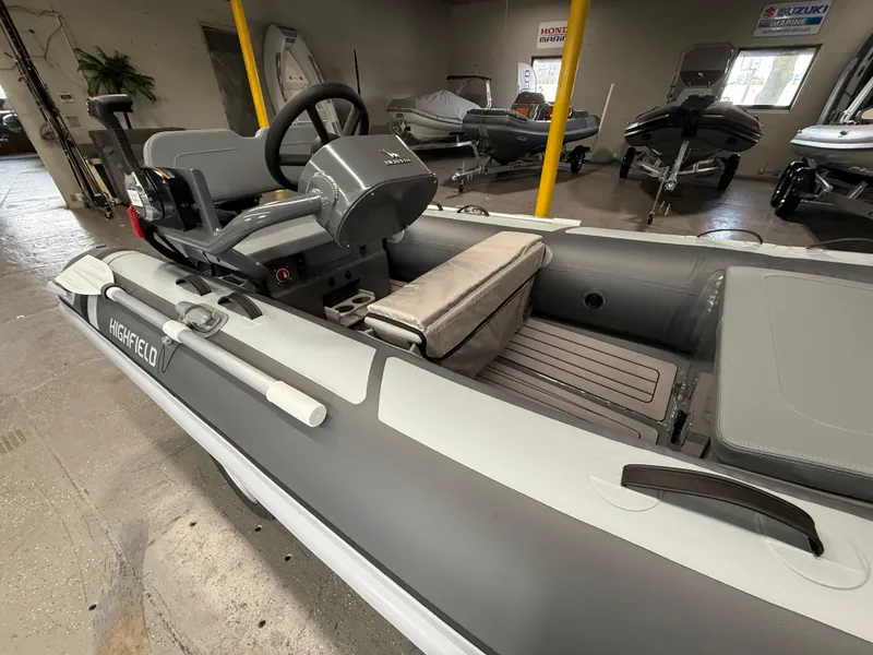 Slide: The Image of 2025 Highfield Classic 380 FCT inflatable boat interior in showroom. - 7