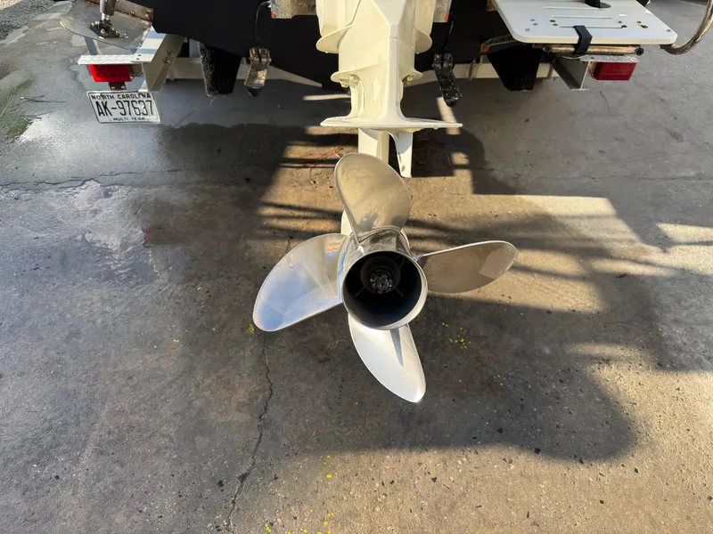 Slide: The Image of White seating on 2020 Long Bay 230 Bay boat with Suzuki outboard motor. - 18