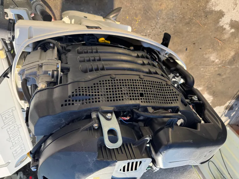 Slide: The Image of Rear view of 2020 Long Bay 230 Bay boat with swim platform and motor mount. - 31