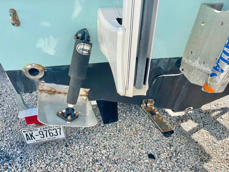 Slide: The Image of Rear view of a 2020 Long Bay 230 Bay boat with North Carolina license plate. - 32