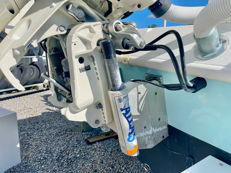 Slide: The Image of Close-up of a 2020 Long Bay 230 Bay boat engine mount and hydraulic system. - 33