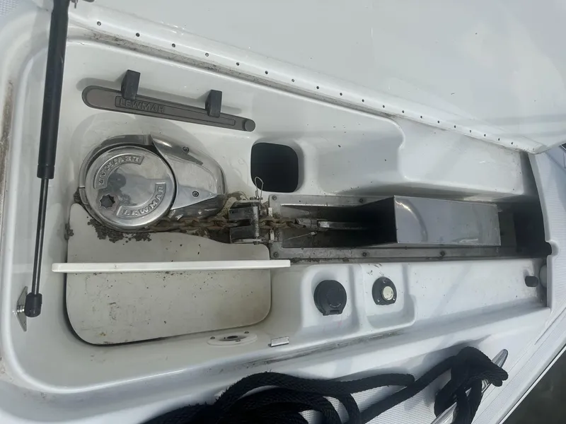 Slide: The Image of Anchor compartment of a 2012 Formula 45 Yacht, featuring a windlass and chain storage. - 16