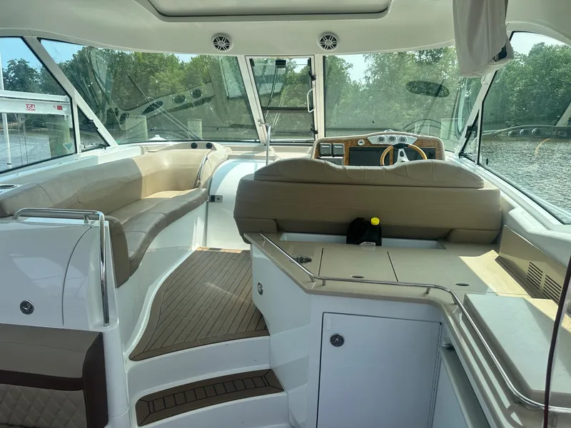 Slide: The Image of Interior of 2012 Formula 45 Yacht with beige seating and modern dashboard. - 19