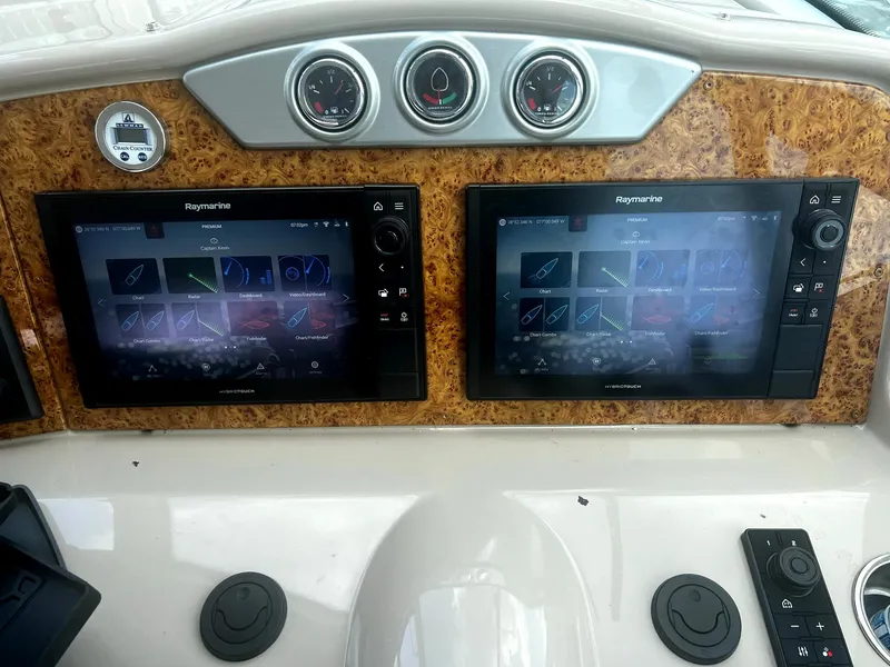 Slide: The Image of Dashboard of 2012 Formula 45 Yacht with dual Raymarine navigation screens. - 21