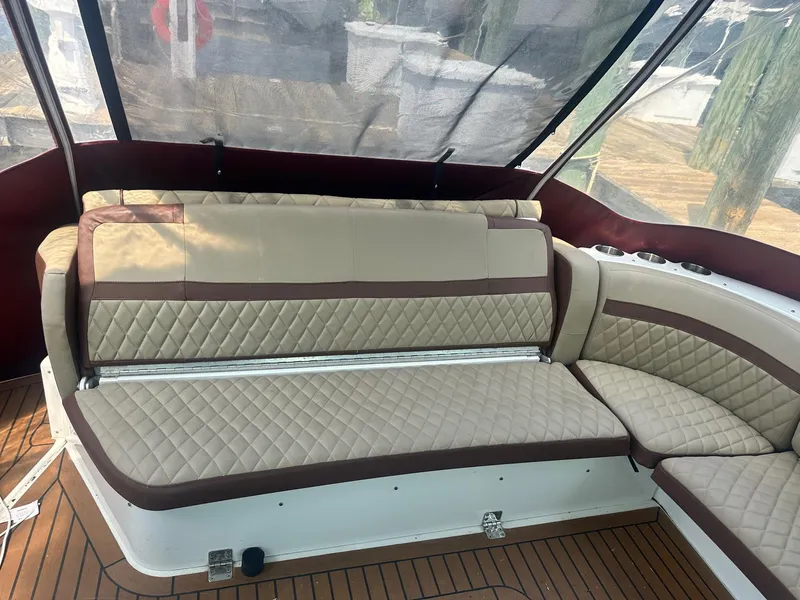 Slide: The Image of Luxurious seating on 2012 Formula 45 Yacht with quilted upholstery and wooden deck. - 26