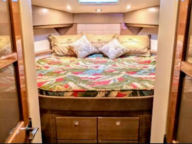 Slide: The Image of Luxurious cabin interior of 2012 Formula 45 Yacht with colorful bedding and pillows. - 37