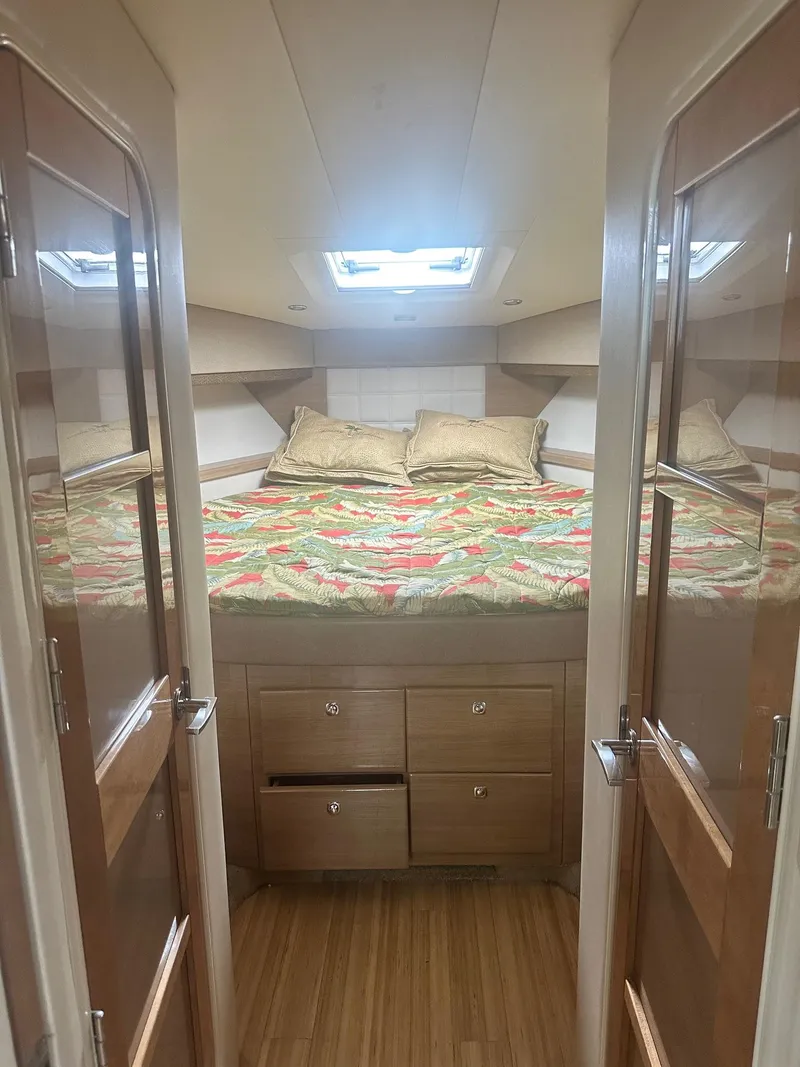 Slide: The Image of Interior of 2012 Formula 45 Yacht with cozy bed and wooden cabinetry. - 39