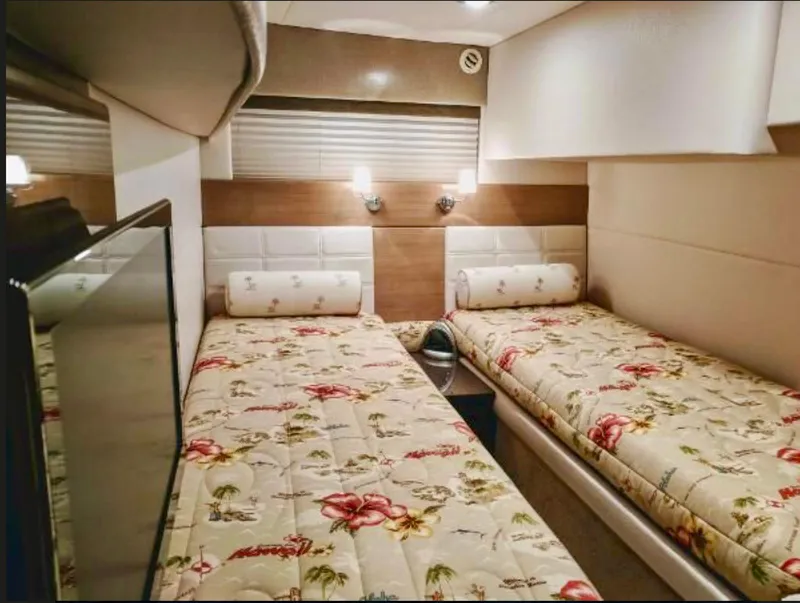 Slide: The Image of Interior cabin of 2012 Formula 45 Yacht with twin beds and floral bedding. - 41