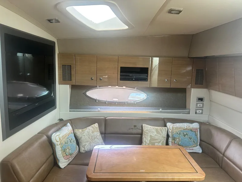 Slide: The Image of Interior of 2012 Formula 45 Yacht with leather seating and wooden cabinetry. - 45