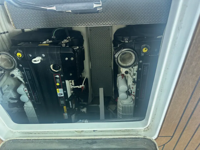 Slide: The Image of Engine compartment of a 2012 Formula 45 Yacht, showcasing dual engines. - 51