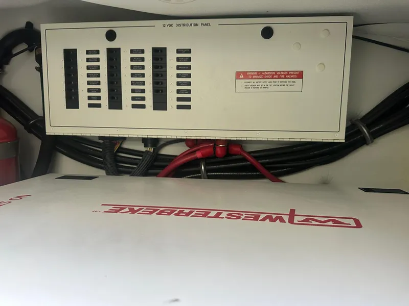 Slide: The Image of Electrical panel and wiring inside a 2012 Formula 45 Yacht engine compartment. - 59