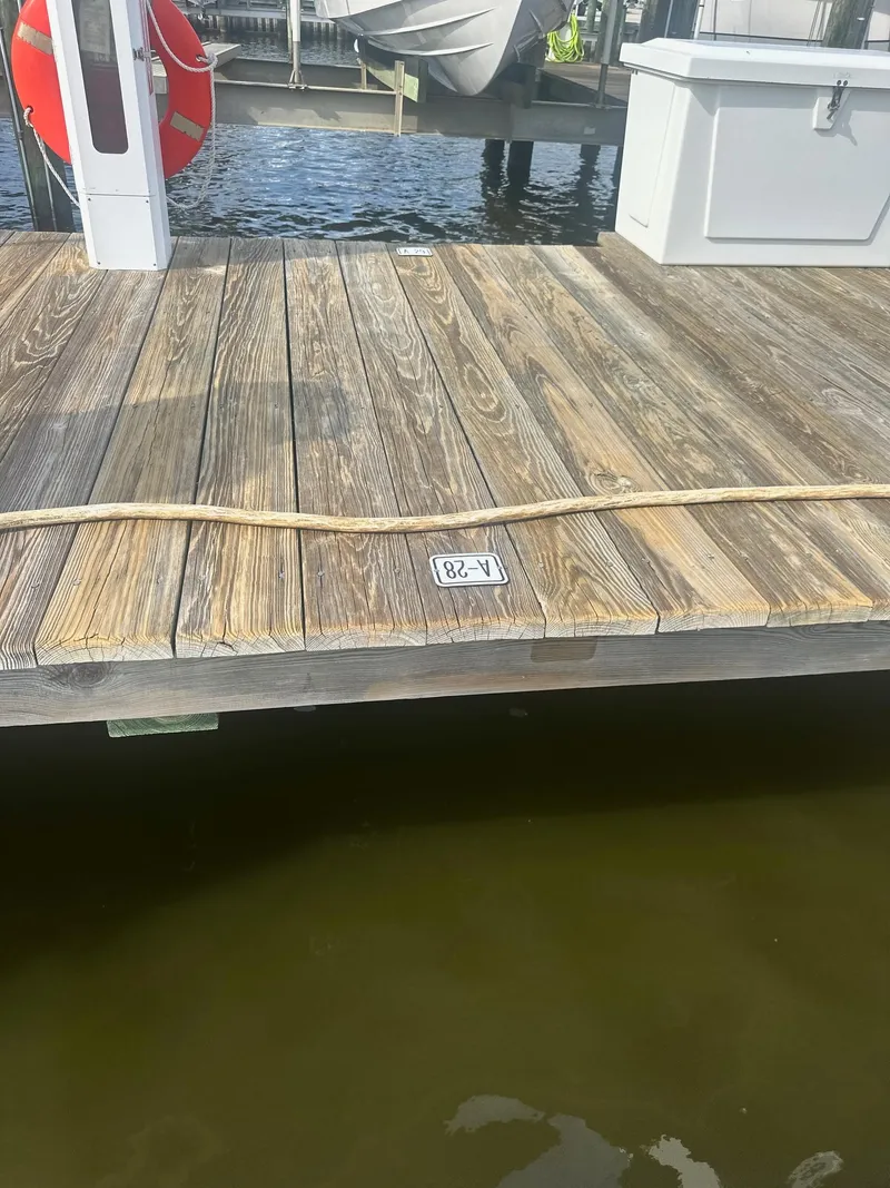 Slide: The Image of Wooden dock with a rope, near water, Formula 45 Yacht, 2012. - 6