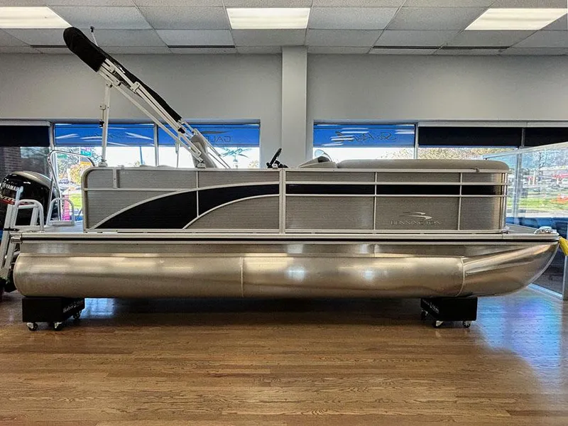 Slide: The Image of 2023 Bennington S 20 Cruise Narrow Beam pontoon boat in showroom. - 1