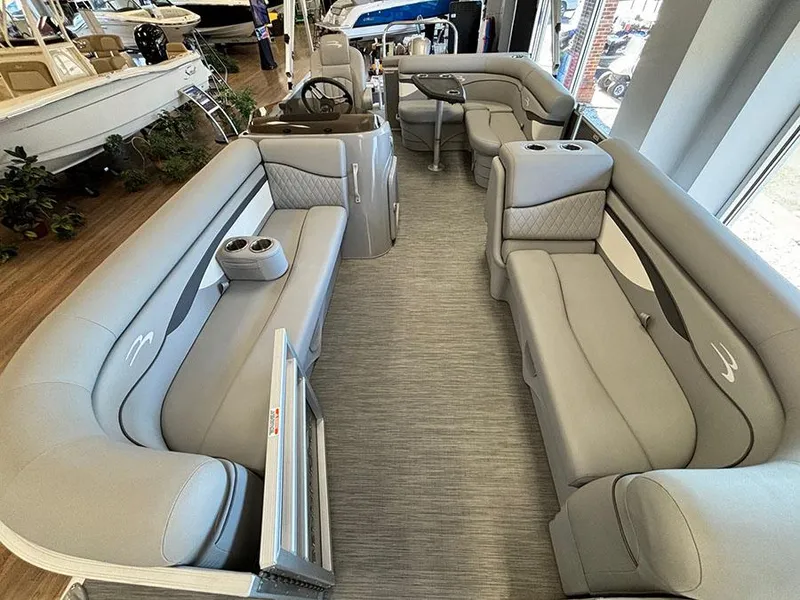 Slide: The Image of 2023 Bennington S 20 Cruise Narrow Beam pontoon boat interior with plush seating. - 14
