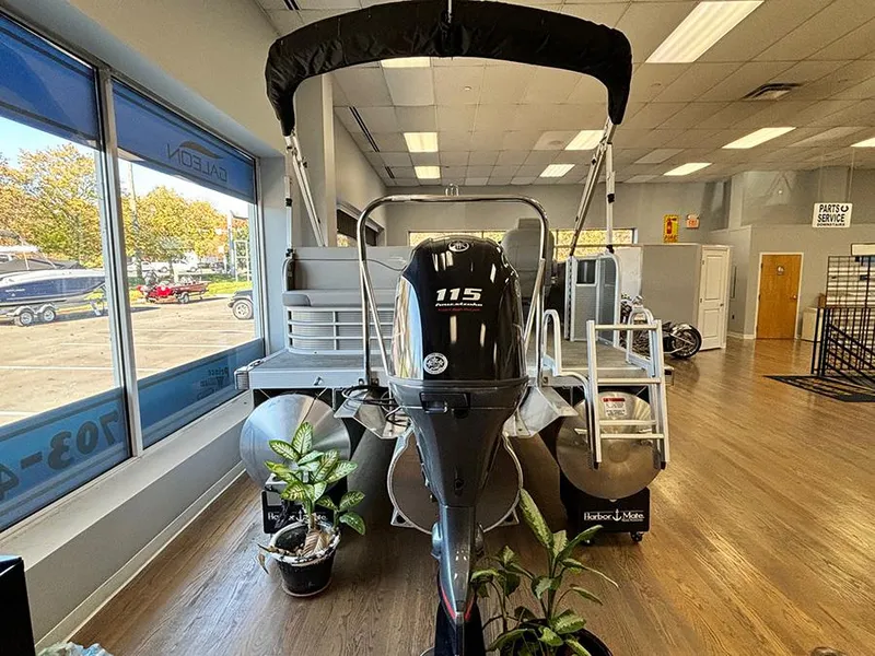 Slide: The Image of 2023 Bennington S 20 Cruise Narrow Beam pontoon boat displayed indoors. - 4