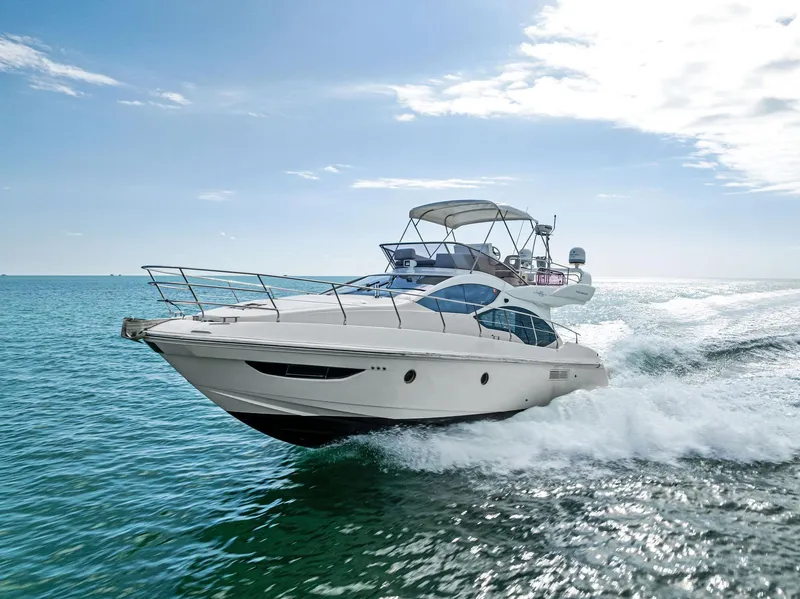 Slide: The Image of Azimut 45 Fly 2014 yacht cruising on open sea under clear sky. - 12