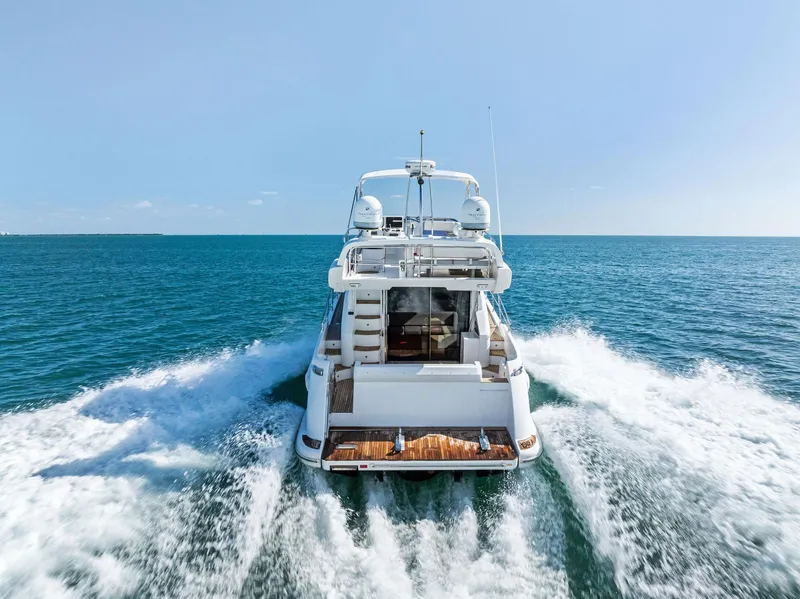 Slide: The Image of Azimut 45 Fly 2014 yacht cruising on open sea, rear view. - 15