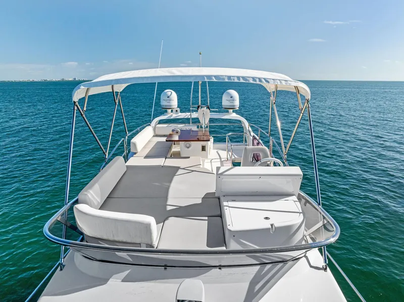 Slide: The Image of 2014 Azimut 45 Fly yacht with spacious flybridge on open sea. - 18