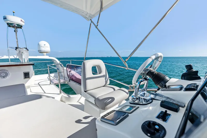Slide: The Image of Azimut 45 Fly 2014 yacht helm with ocean view and modern controls. - 23